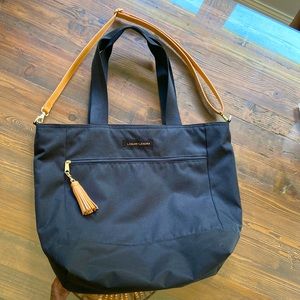 Logan + Lenora Daytripper in black with crossbody shoulder strap in camel.